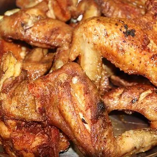 a pan full of chicken wings