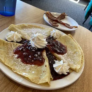 I believe my friend ordered Potato Pancakes  They arrived with lingonberries, delicious