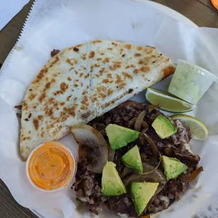 El dorado quesadilla ($9.50) and taco