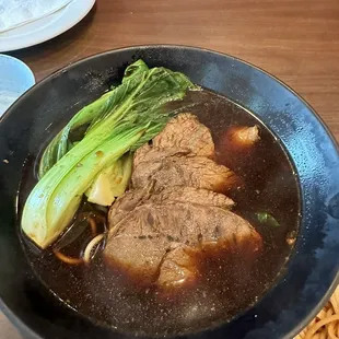 Beef noodle soup . Taste like watered oyster sauce. Terrible