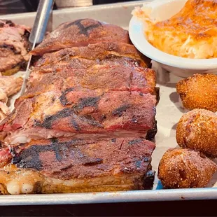 Pulled pork, brisket, Tennessee ribs, hush puppies and hash brown casserole