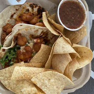 Firecracker Tacos (2) - firecracker shrimp, cajun ranch, leaf lettuce, pico de gallo. Served with chips and salsa.