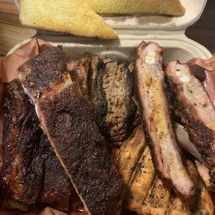 Austin combo. Ribs, chicken, brisket. Dry rub ribs
