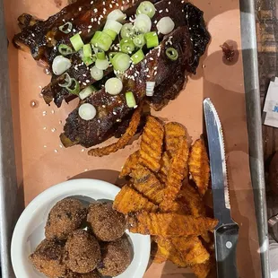 Sticki ribs were lathered in a delightful sauce with hints of teriyaki. Prepared perfectly and fall off the bone tender.