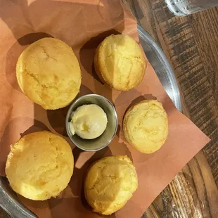 Corn muffins were fluffy and moist. Served with softened butter.