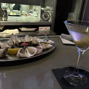 Oysters on the half shell and a dirty martini.