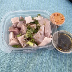 Hamachi poke from The Little Fish Company. Comes with sauces.