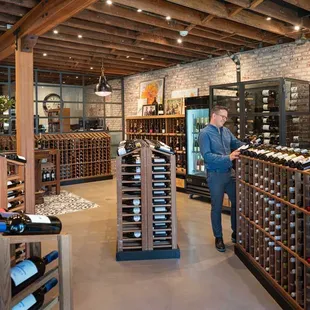 a man in a wine store