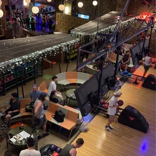 a crowd of people playing bowling