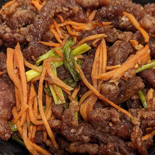 beef and carrots in a bowl