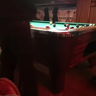 a pool table in a pub