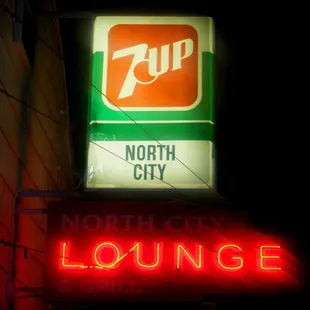 a neon sign for a lounge