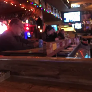 people sitting at the bar