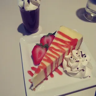Okay strawberry cheese cake with what i thought was chocolate mousse but turned out to have the texture of uncooked browney batter.