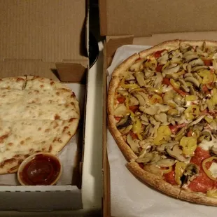 Large (12 slice) pepperoni, mushroom, and mild peppers and small cheesy bread for $21.25. Very tasty