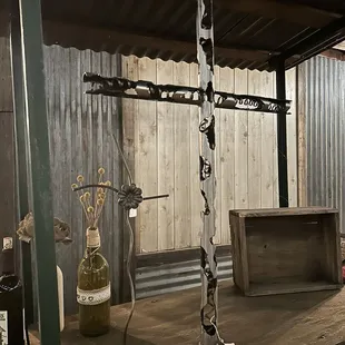 The two pieces of creative metal art were purchased at closing time