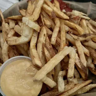 Huge basket of fries with beer cheese