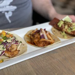 Blackened Shrimp Taco, Cochinita pibil taco, Filet Mignon Taco