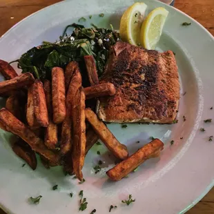 Blackened salmon with sweet potato fries and sauteed spinach