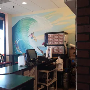 a surfboarder in the background