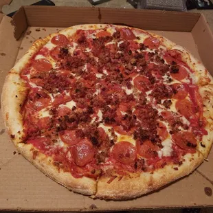 Bacon, sausage, and pepperoni pizza