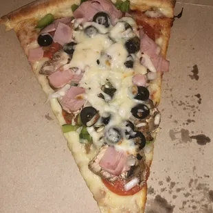 a slice of pizza in a box