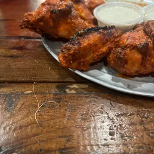 Burnt chicken wings.