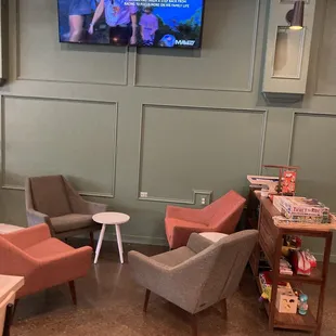 two chairs and a television