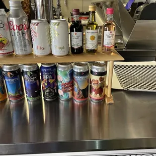 a variety of beverages on a counter