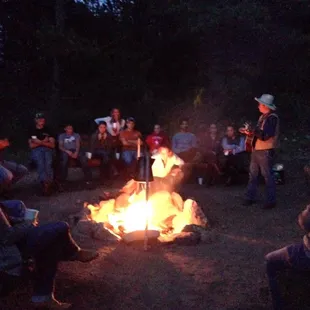 Cowboy singer by the fire