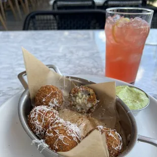Cacio e Pepe Arancini with La Dolce Vita mocktail
