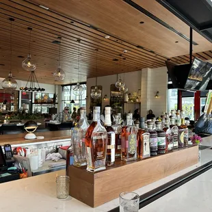 Liquor display in front of multiple seats blocking access