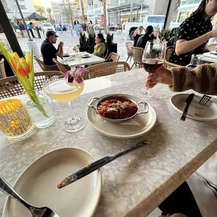 Meatballs, Juliette cocktail and red wine