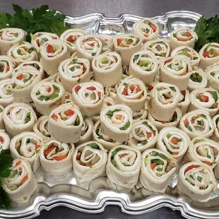 a platter of sandwiches