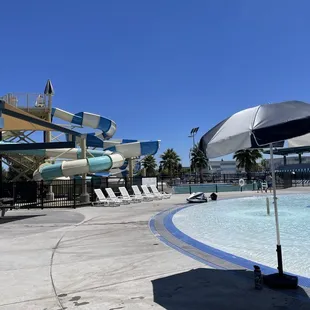 Big water slides next to toddler area