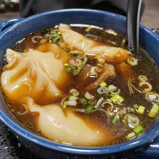 Pork dumplings in beef broth