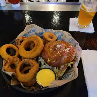 Turkey Melt on pretzel bun with onion rings