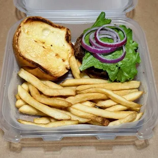 Curbside pickup of burger and fries.