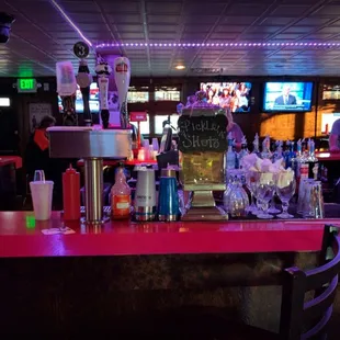 a bar with neon lights