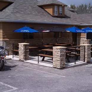 a motorcycle parked in front of the restaurant