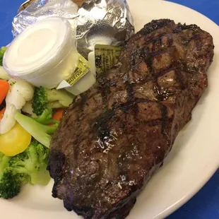 steak and vegetables on a plate