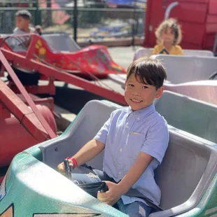My son riding one of the smaller warp rides