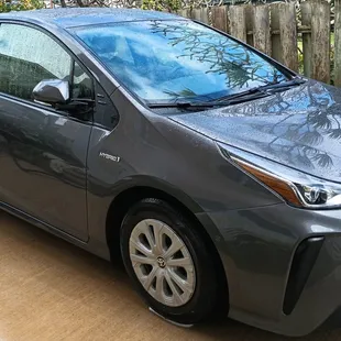 Enjoy a quiet ride in our new and surprising large comfortable and spacious electric/hybrid Toyota Prius. It seats four passengers.