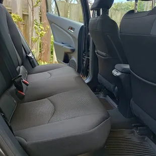 Roomy back seat for 3 passengers in our electric/Hybrid Prius