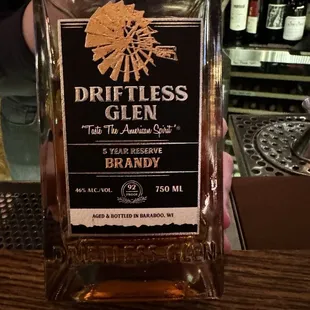 a bottle of driftless gin