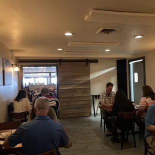 a group of people sitting at a table