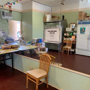 Loyalty card details on the wall.