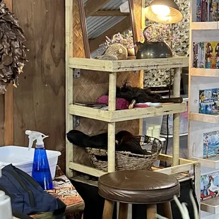 a shelf with a mirror and a lamp