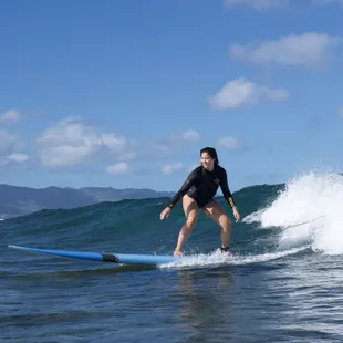 All smiles learning to surf at North Shore Oahu Surf School.