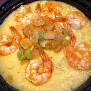 a bowl of shrimp and grits